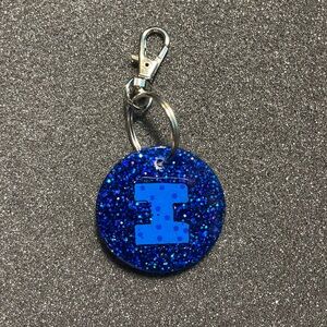 Blue “I” circe keychain $10
